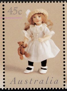 Australia-1997-Dolls-and-Teddy-Bears-45-cent-Multi-P14-5-x-14-Doll-wearing-white-dress-with-teddy-bear-Susie-McMahon-Miniature-SG1695