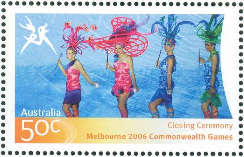 Australia-2006-Commonwealth-Games-Closing-Ceremony-26-March-2006-50-cent-Multi-P14-60-x-13-86-Four-women-in-line-walking-to-left-with-ornate-head-dress-SG