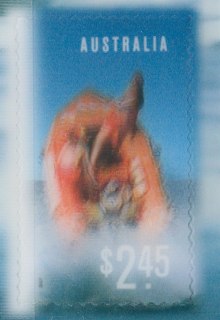 Australia-2007-Year-of-the-Surf-Lifesaver-2-45-dollar-Multi-Pdie-cut-11-1-x-11-3-interr-Powered-rubber-dinghy-broaches-wave-Boat-and-waves-move-as-stamp-moves-SG