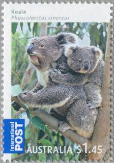 Australia-2009-Australian-Bush-Babies-Mammals-1-45-dollar-Multi-P13-86-x-14-6-Koala-Phascolarctos-cinereus-with-baby-on-back-in-typical-tree-fork-repose-SG3218