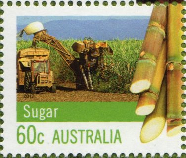 Australia-2012-Farming-Australia-60-cent-Multi-P14-4-x-14-Sugar-Shows-some-cut-canes-before-background-of-machine-harvester-SG3746