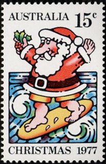 Australia-1977-Christmas-15-cent-Multi-P14x15-Santa-on-surf-board-SG655