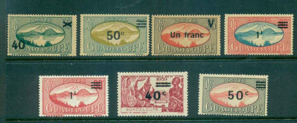 Guadeloupe-1943-44-Pictorials-Surch-Asst-jpg-MLH-FU-lot49448.jpg